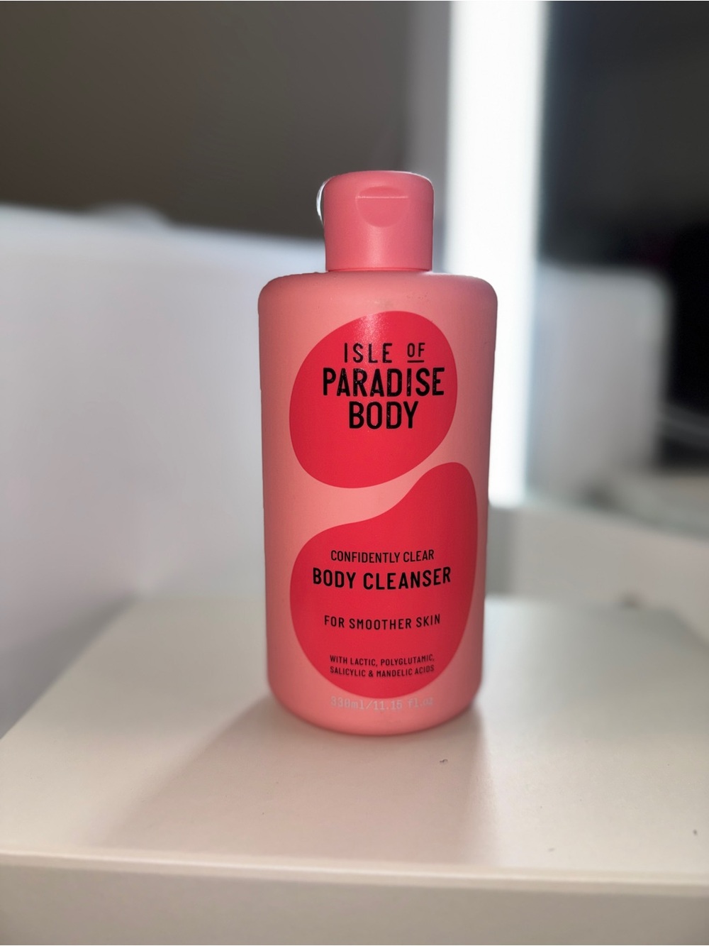 Isle of Paradise Pink Body Cleanser with Red Accents